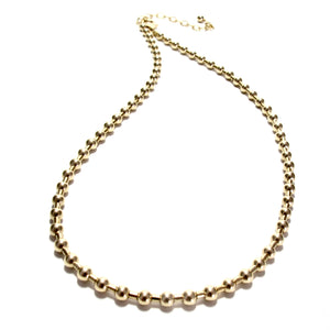 gold bead and tube necklace