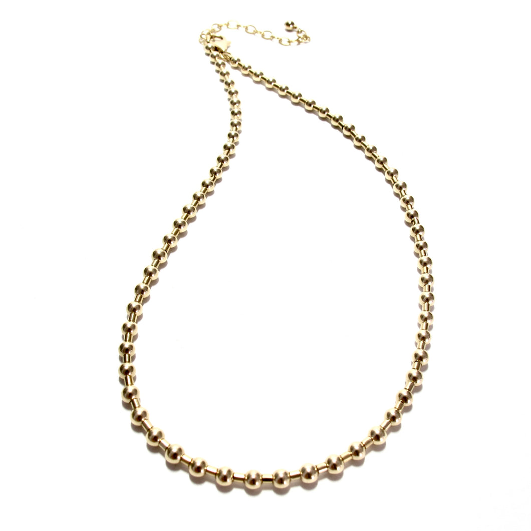 gold bead and tube necklace