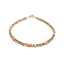 Load image into Gallery viewer, dotted coral medium faceted beads bracelet