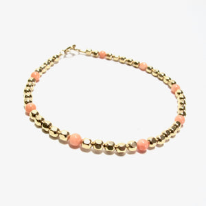 dotted coral medium faceted beads bracelet
