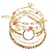 Load image into Gallery viewer, dotted coral medium faceted beads bracelet