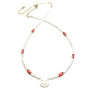 mother of pearl & neon orange smiley necklace