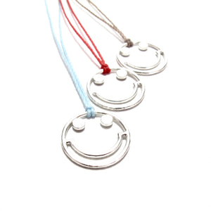 silver smiley cord necklace