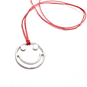 silver smiley cord necklace