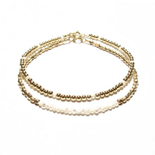 Load image into Gallery viewer, pearl line and golds beads bracelet
