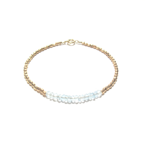 aquamarine line and gold beads bracelet