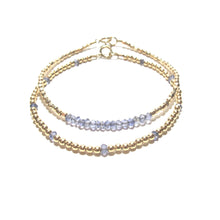Load image into Gallery viewer, blue iolite line and gold beads bracelet