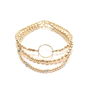 gold beads and ring bracelet
