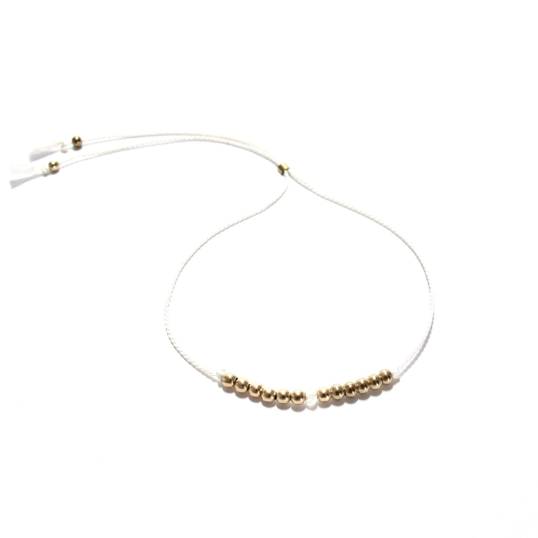 white silk friendship bracelet