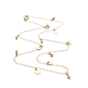multi discs and gold beads necklace