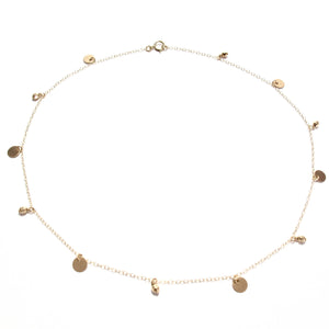 multi discs and gold beads necklace