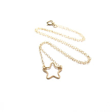 Load image into Gallery viewer, small cut out star necklace