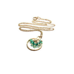 green onyx in a ring necklace