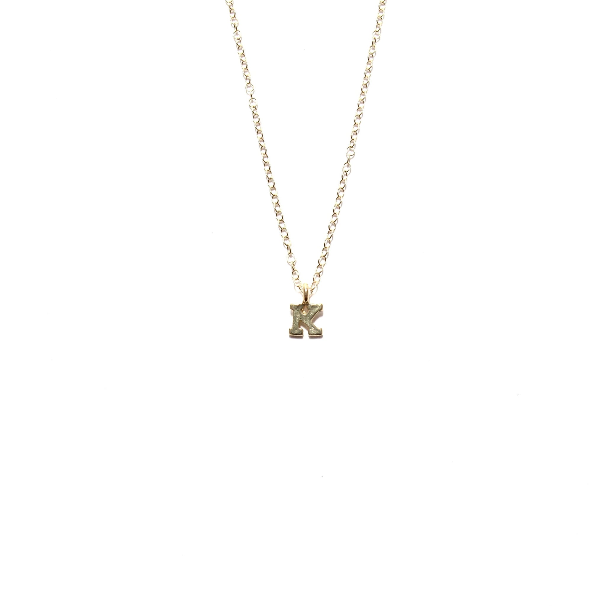 Tiny gold sales initial necklace